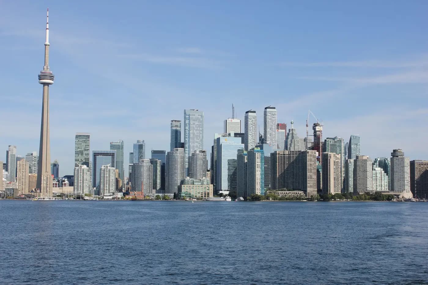 The Toronto skyline and the CN Tower seen across the water.